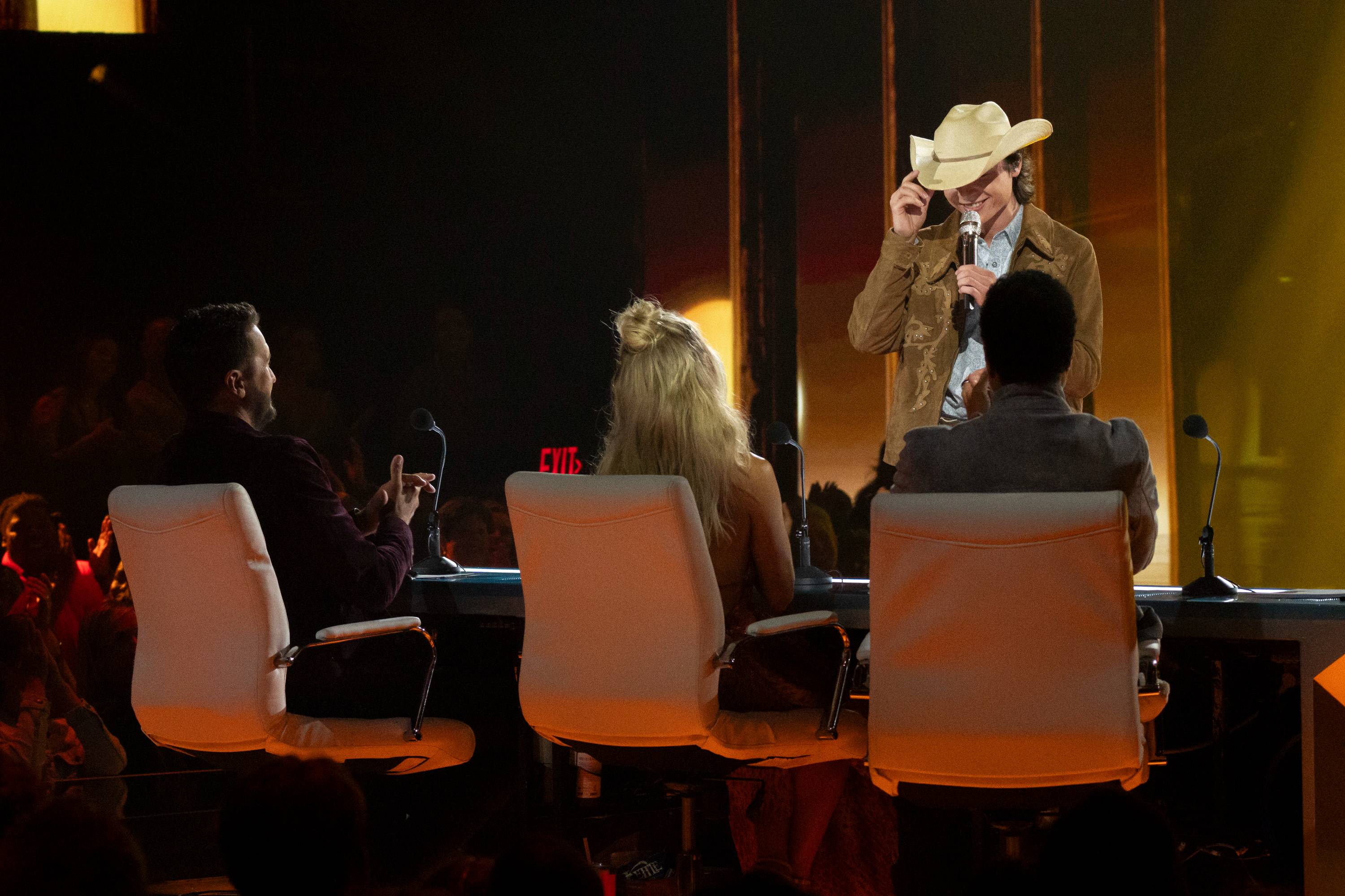 John Foster tips his hat