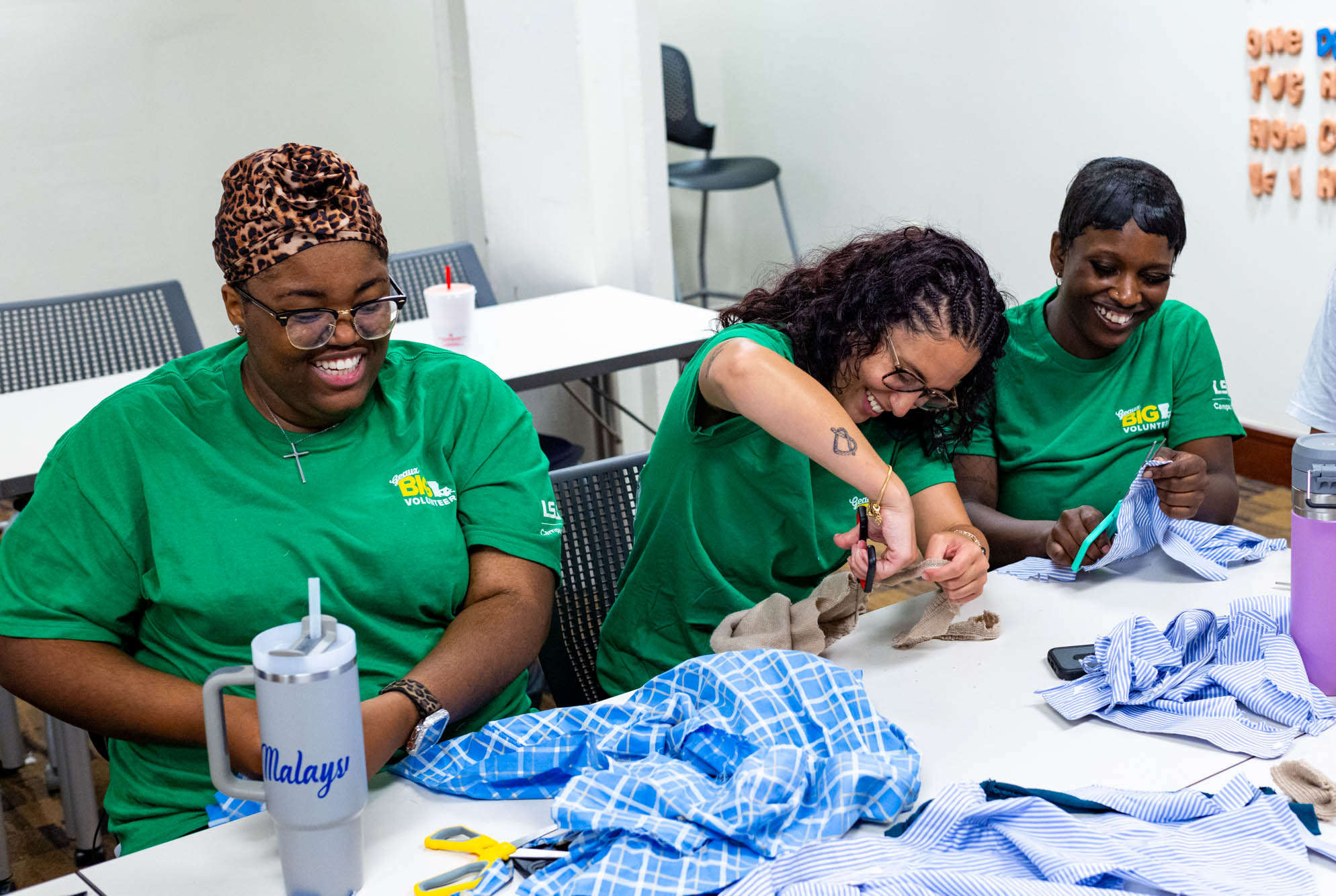 Students volunteer constructing dog toys for a local animal shelter during Geaux Big Baton Rouge 2026.