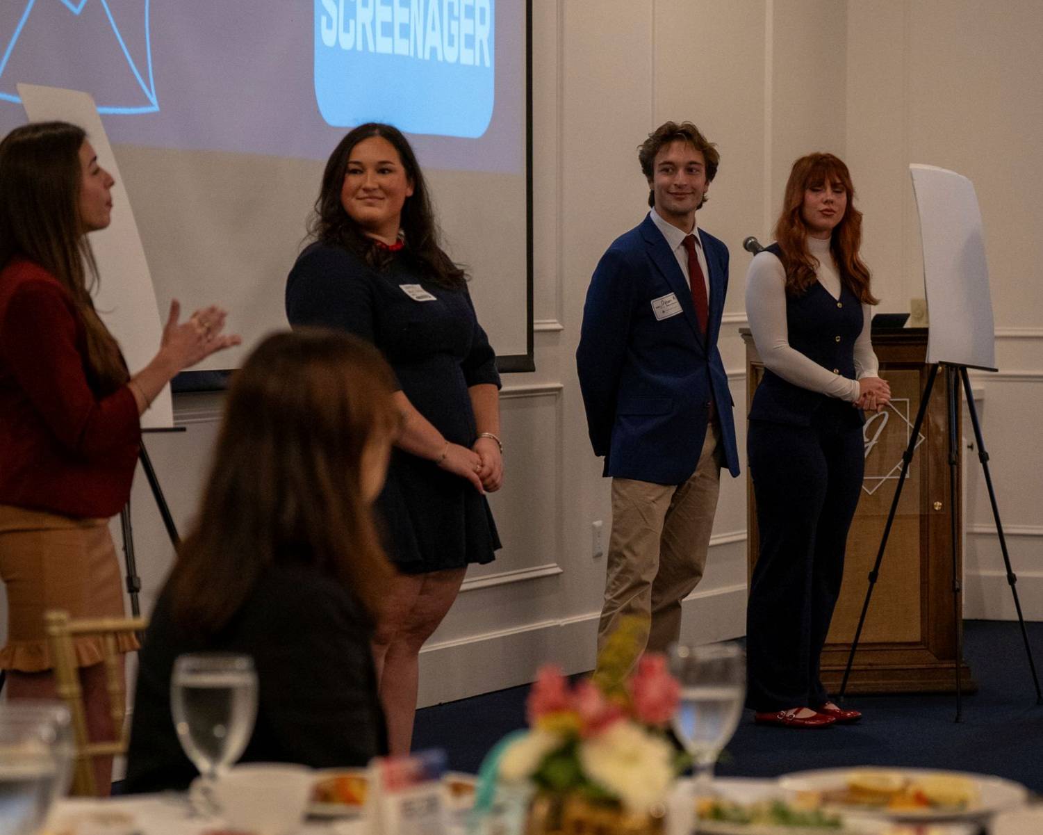 Students presenting their work to AAF-BR