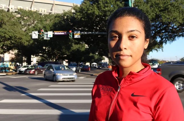 LSU student Mari Dehrab returns to the crosswalk she was waiting to cross when she was hit by a car.