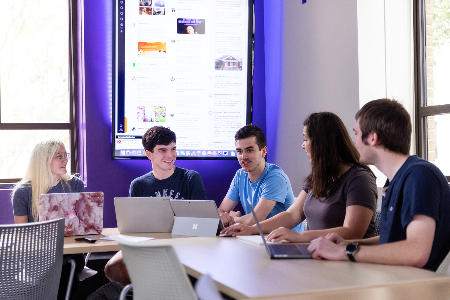 Group of students around a table