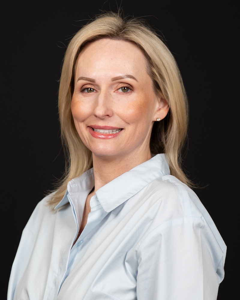 Headshot of Laura Metcalf