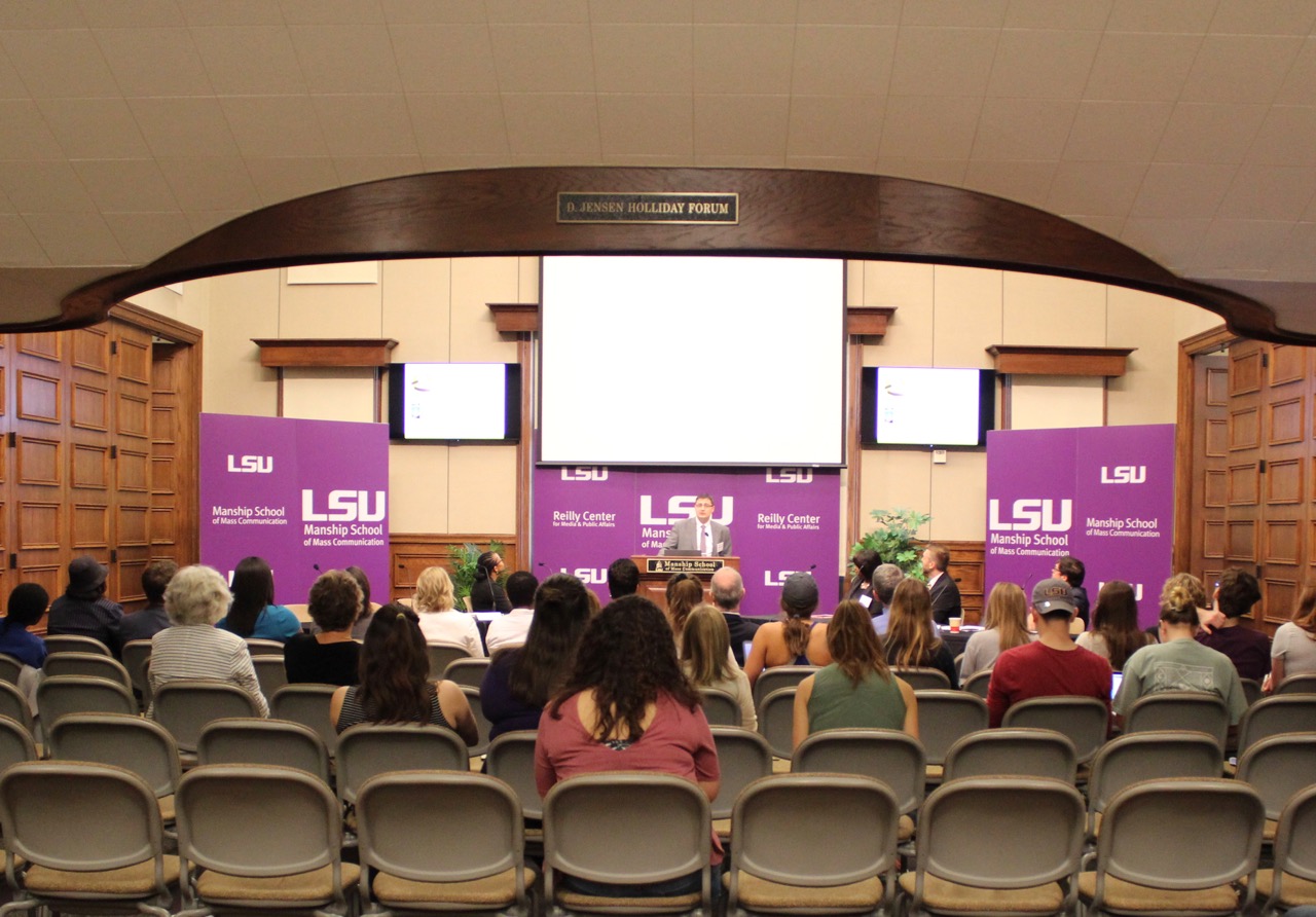 Image of crowd in the Holliday Forum and the Manship School