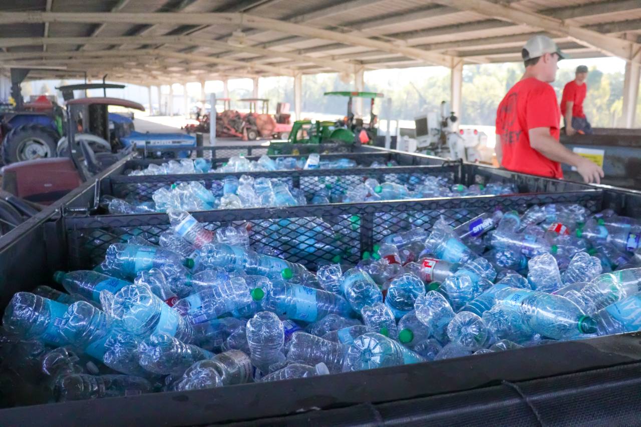 A trailer with bottles and cans.