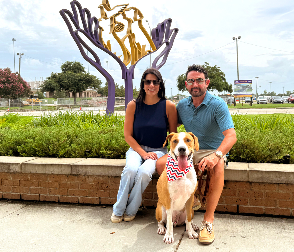 Dawn Amato Adam Cutrer with Dumpster in front of LSU Vet Med