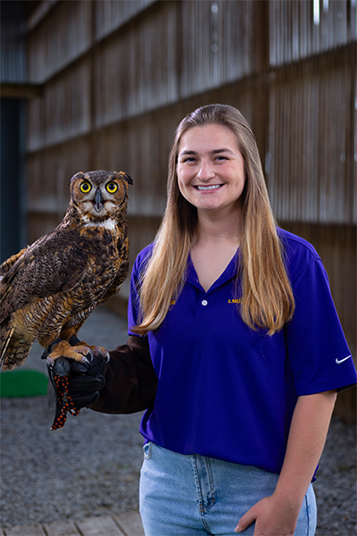 Adeline Fogle with Great Horned owl