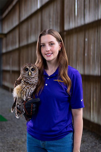 Abigail Gunby with barred owl