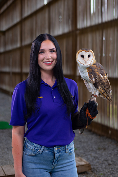 Sarah Vielee with a barn owl